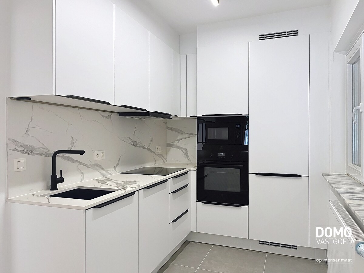 VOLLEDIG GERENOVEERD APPARTEMENT MET TERRAS EN GARAGE TE HASSELT 