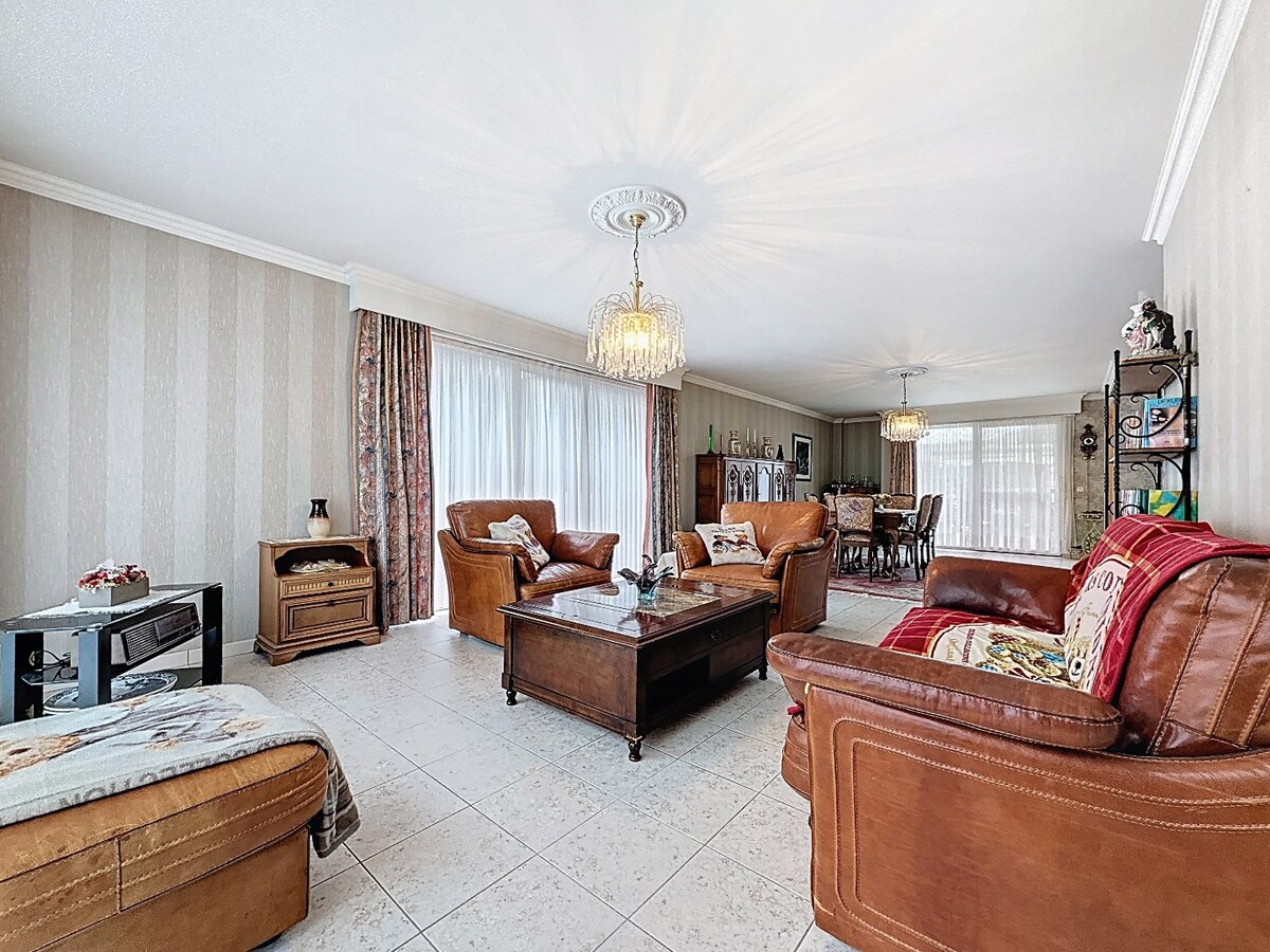 Energiezuinig gelijkvloersapp. met tuintje en garage te centrum Wetteren 