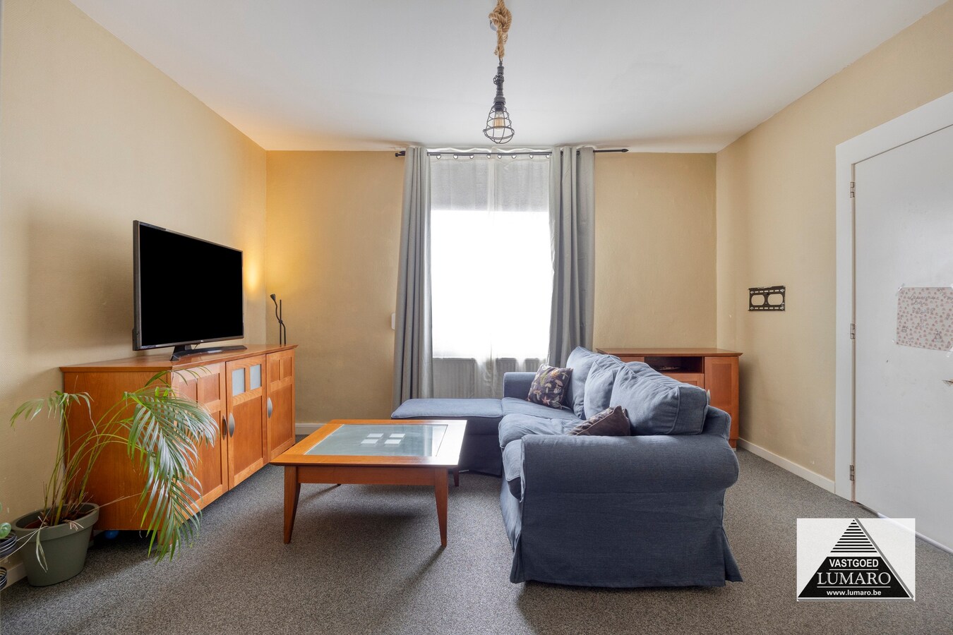 Ideale praktijk- of kangoeroewoning met tuintje en parking 