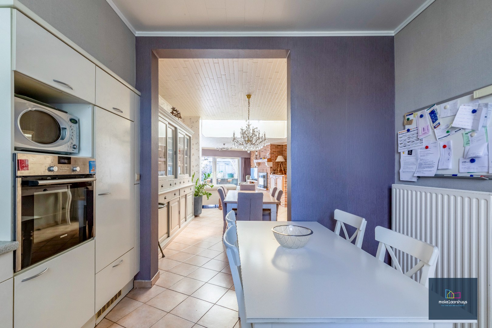 Goed onderhouden en ruime woning in rij met tuin/terras te Wondelgem 