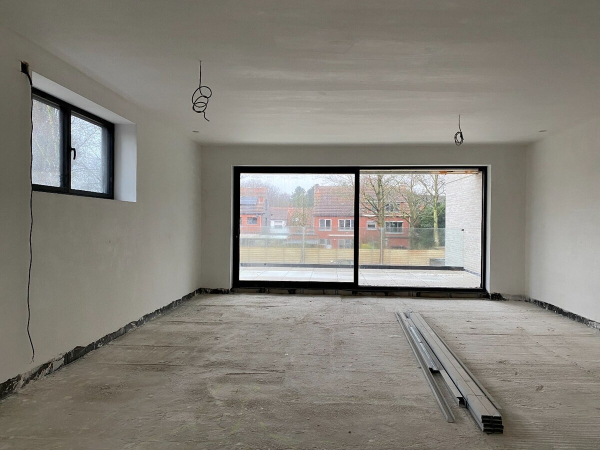 Luxueus én energieneutraal nieuwbouw villa-appartement  van 168 m² met 3 slaapkamers + 2 ondergrondse staanplaatsen + ruime kelder in kleine residentie te Schilde 