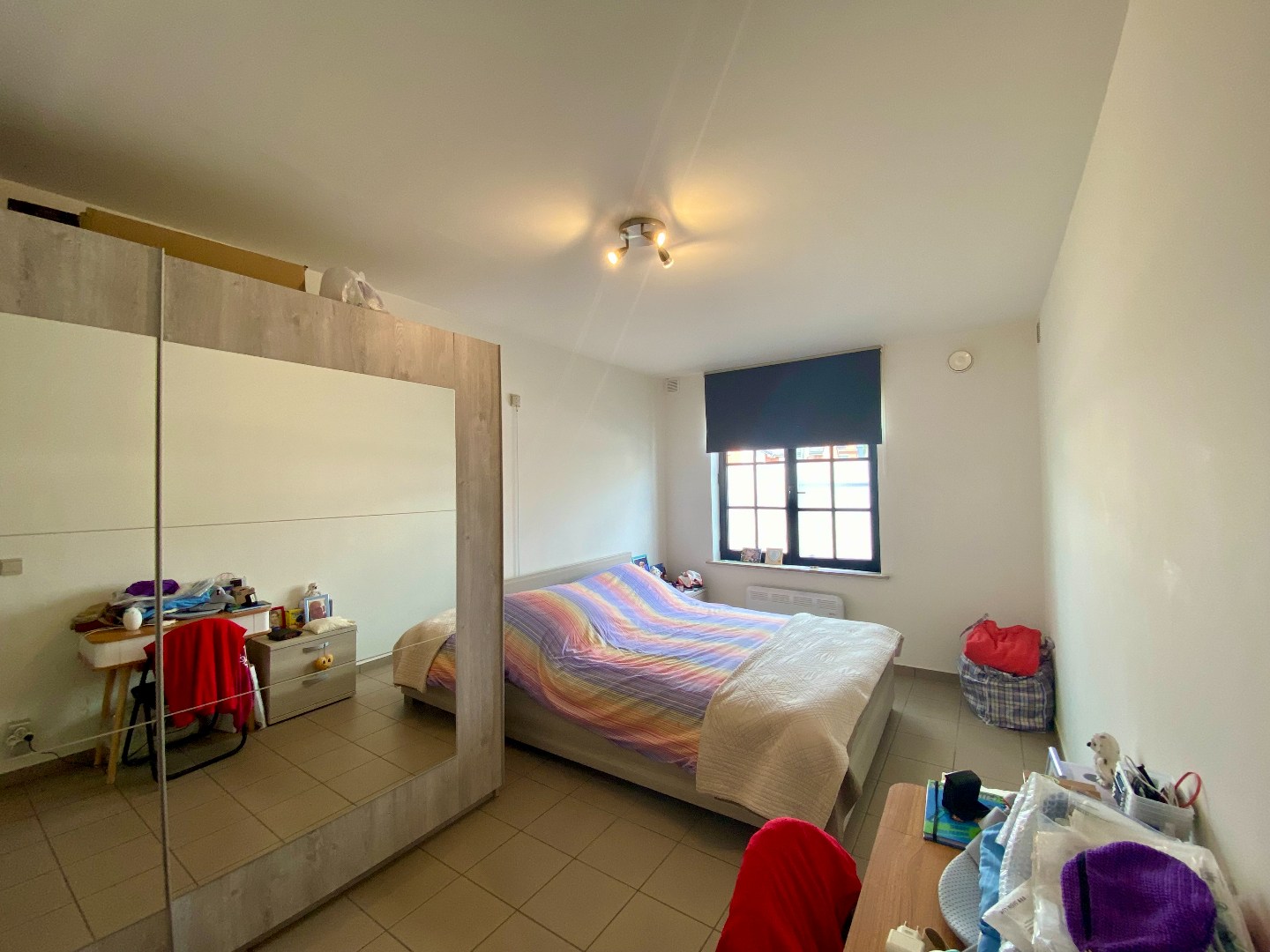 Gelijkvloers appartement met 2 slaapkamers, garage en groot terras op centrale ligging! 