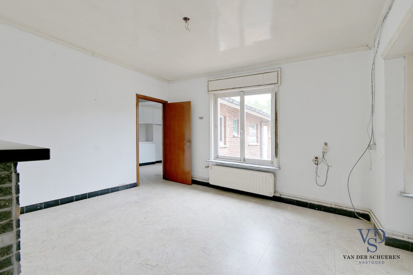 Degelijke, goed gelegen woning. 