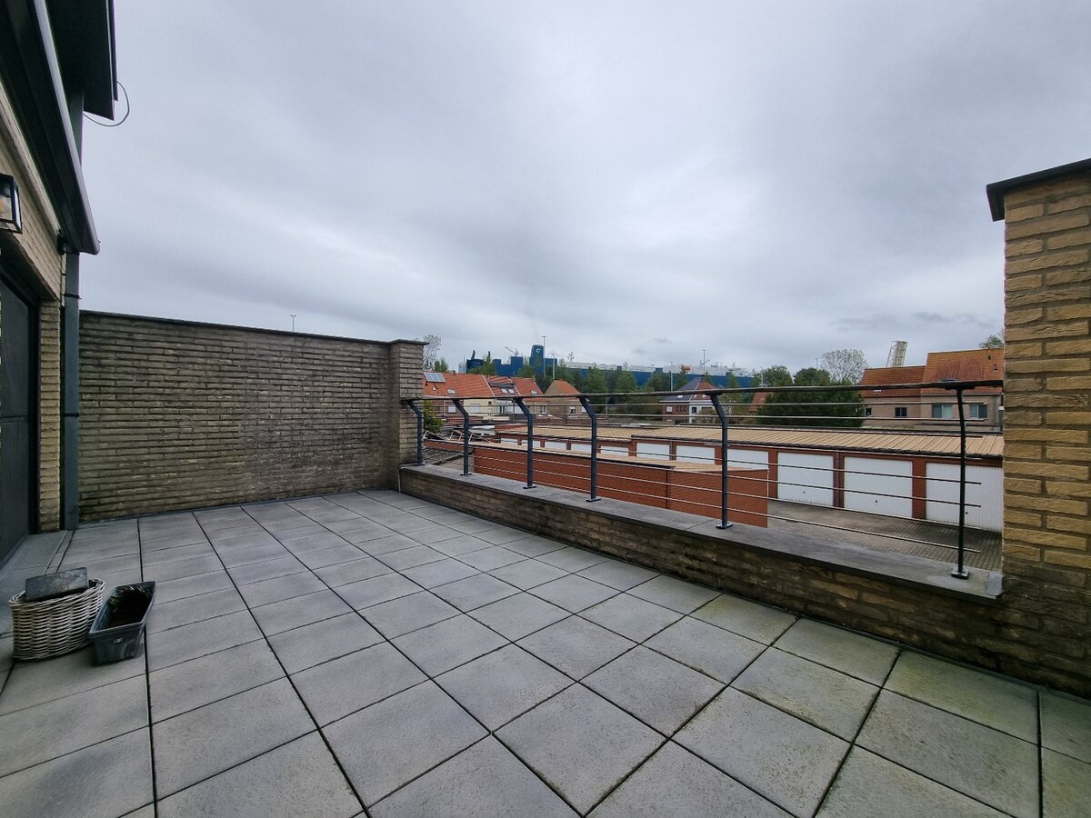 Energiezuinige halfopen gezinswoning met tuintje en ruim terras. 