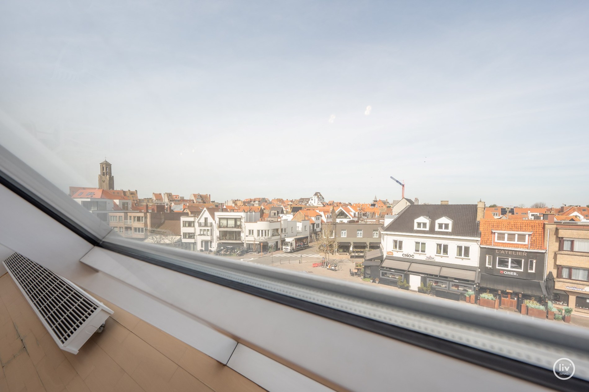 Lichtrijk en stijlvol loftappartement (110 m²) met zonneterras en panoramisch uitzicht in hartje 'Oude Knokke'' 