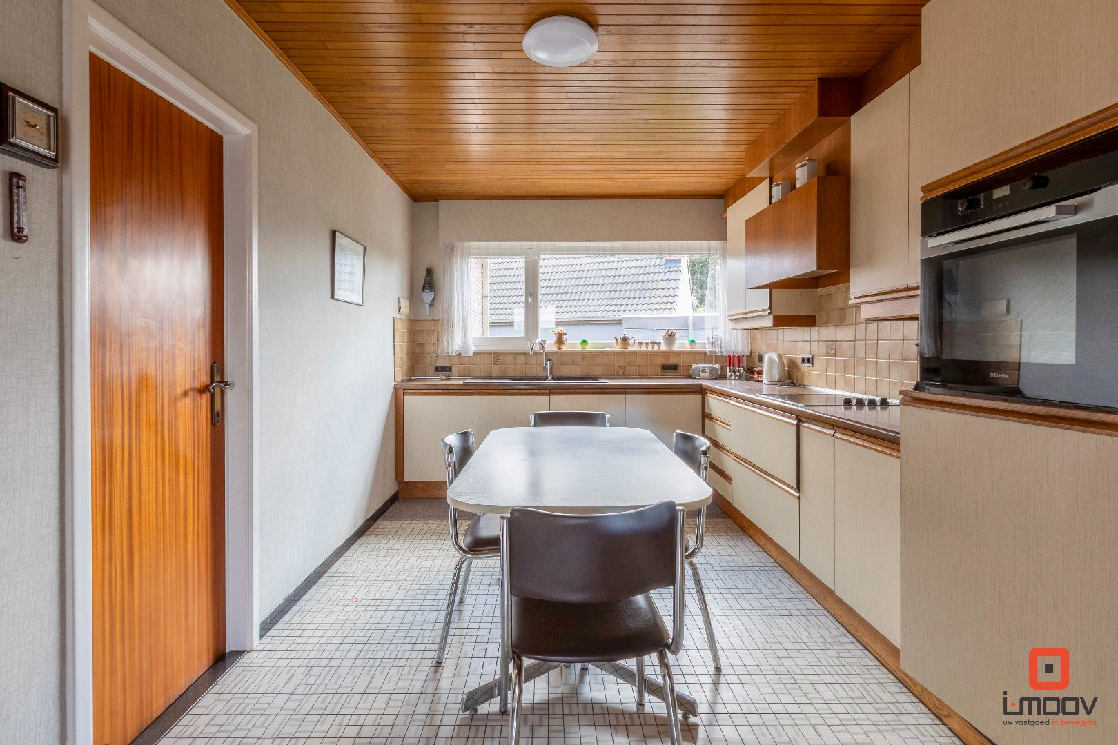 Charmante bungalow met potentieel in rustige buurt te Evergem 