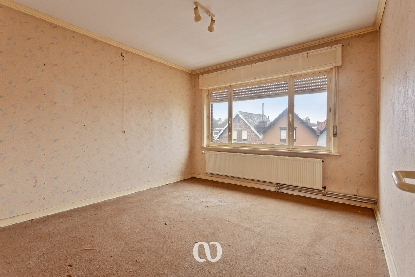 Te renoveren gezinswoning met mooie tuin in Oudenaarde 