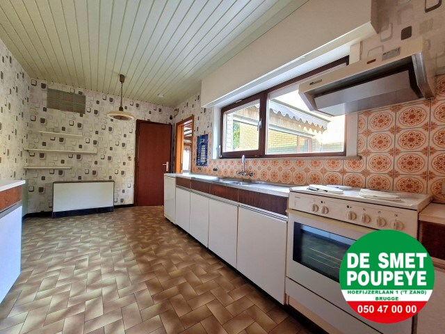 Ruime rijwoning met garage en tuin 