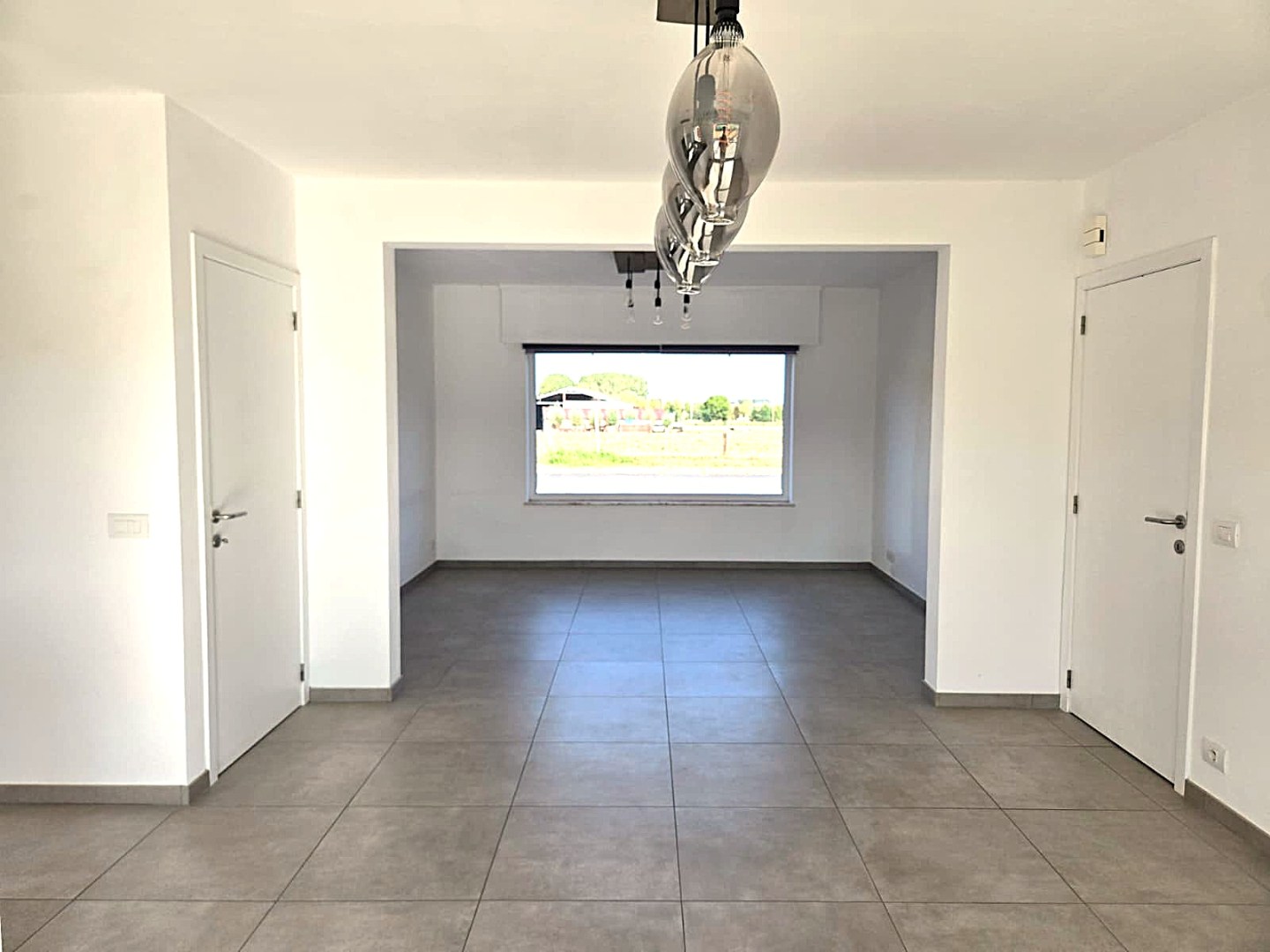 Energiezuinige halfopen woning met tuin en carport te Zulte 