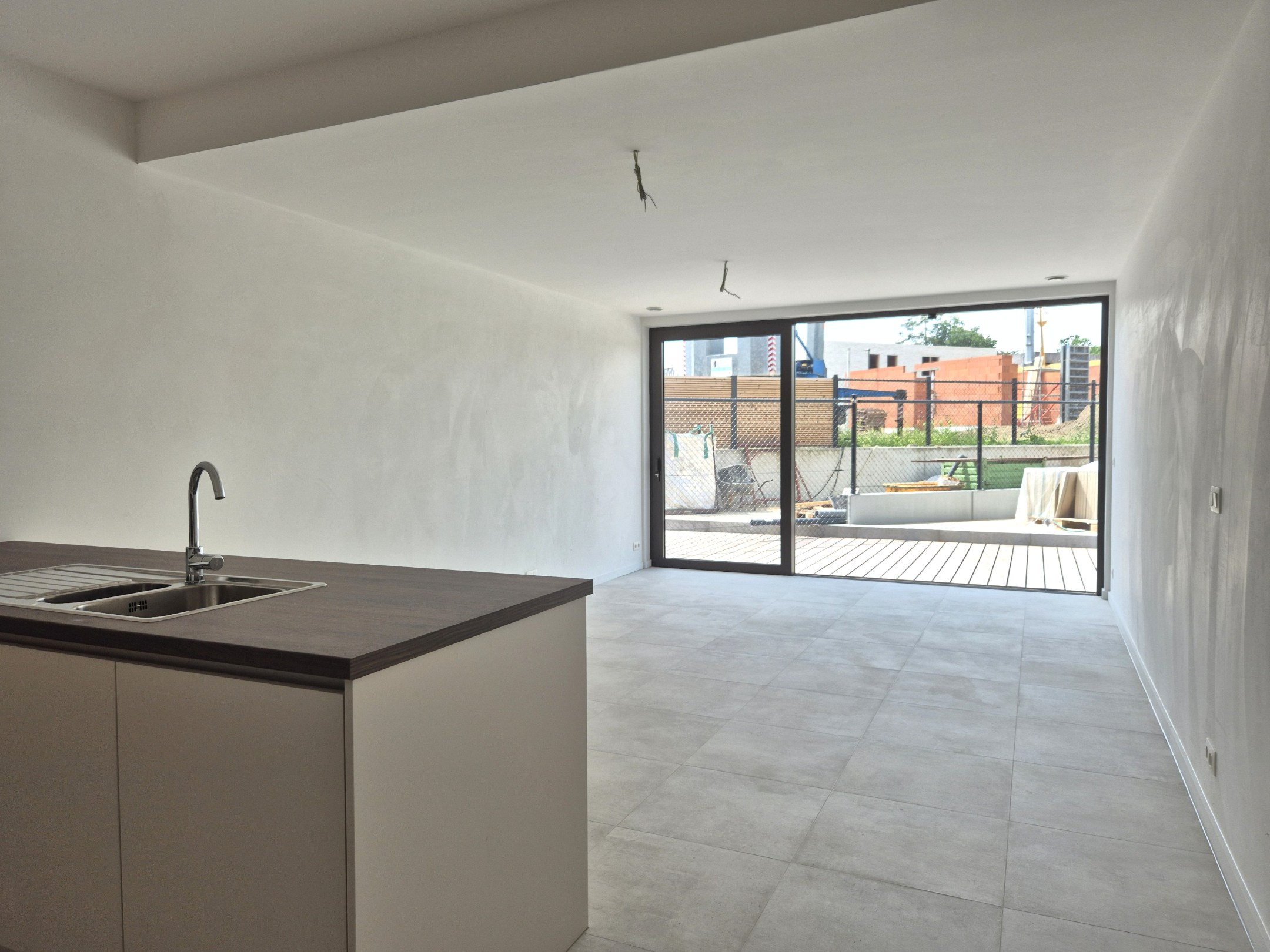 Gelijkvloers appartement met 2 slaapkamers, tuin en terras 
