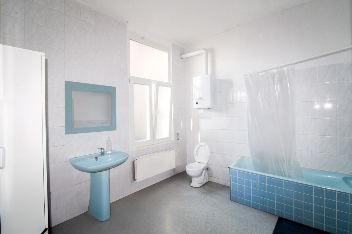 Investeren in het hart van Sint-Niklaas: Veelzijdig handelshuis met uitbreidingspotentieel in bruisend centrum te koop 