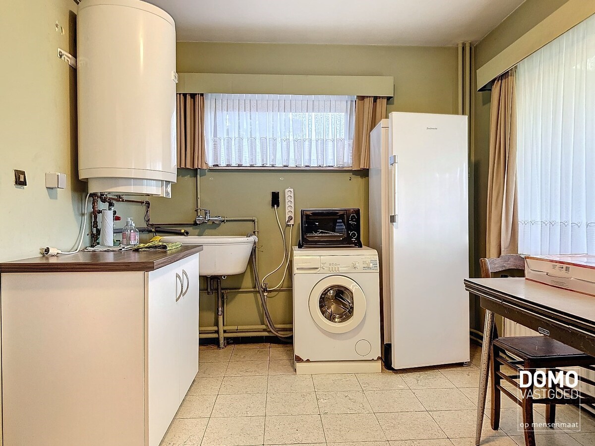 Charmante woning met ruime tuin en inpandige garage, rustig gelegen te Spalbeek. 