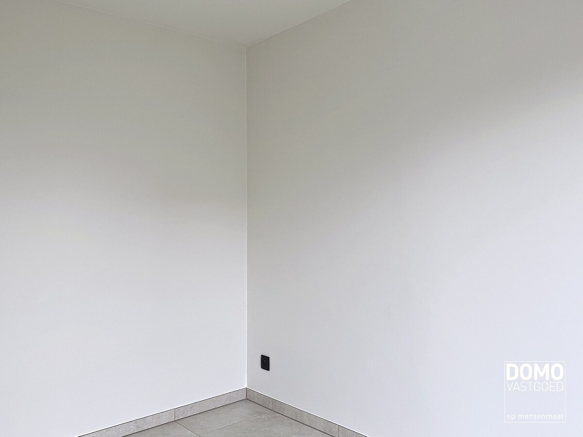 Modern gelijkvloers appartement gelegen te Kermt - 2 slaapkamers - energiezuinig - ruim terras 