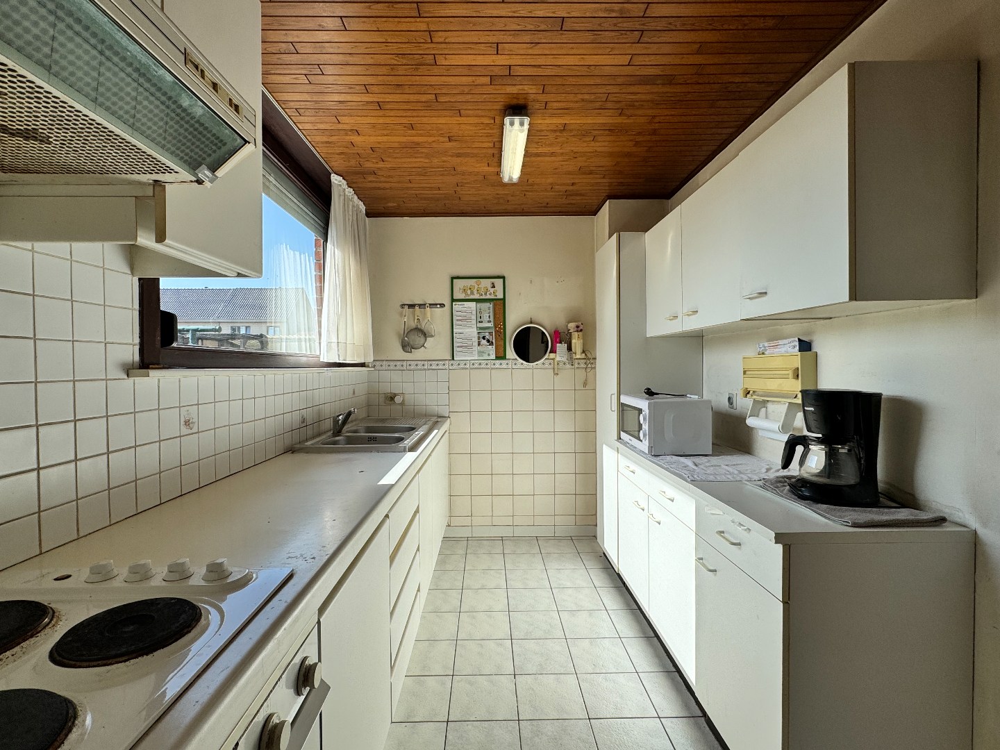 Gezellige woning met stadstuin, garage en uitweg langsachter. 
