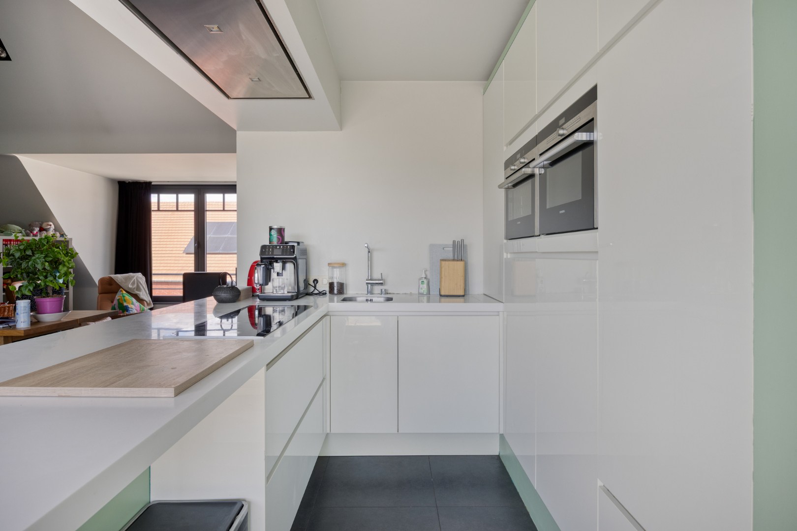 Instapklaar dakappartement met 2-3 slpk. en ruim terras in Olen-centrum 