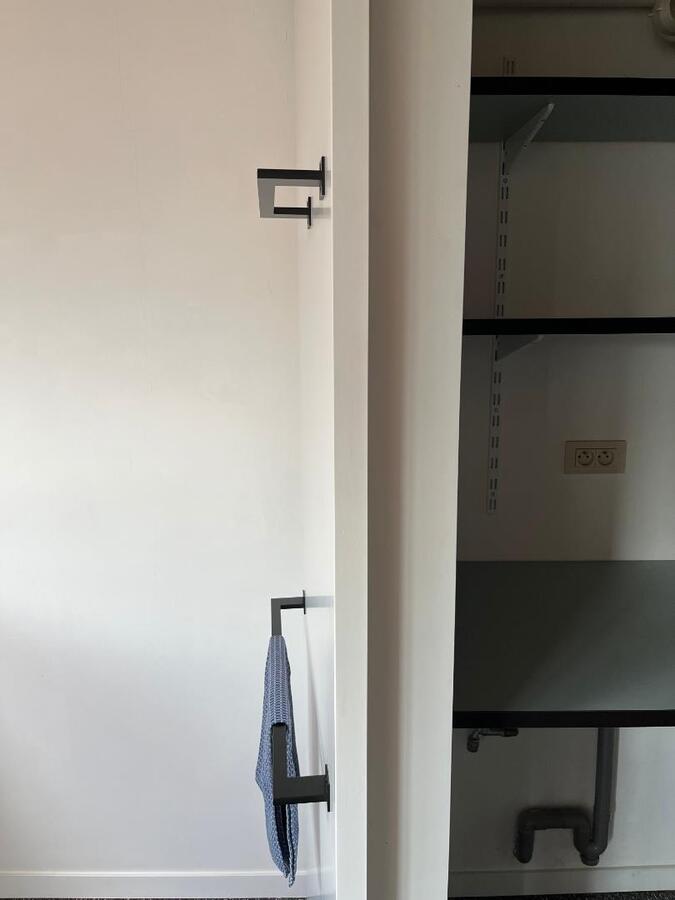 Design duplex appartement te centrum Dikkelvenne. 