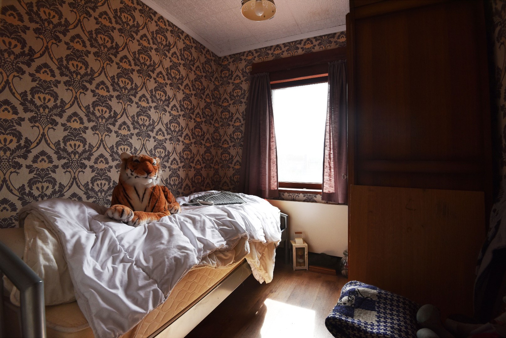 Op te frissen rijwoning met 3 slpks en tuin te Blankenberge (Uitkerke) 