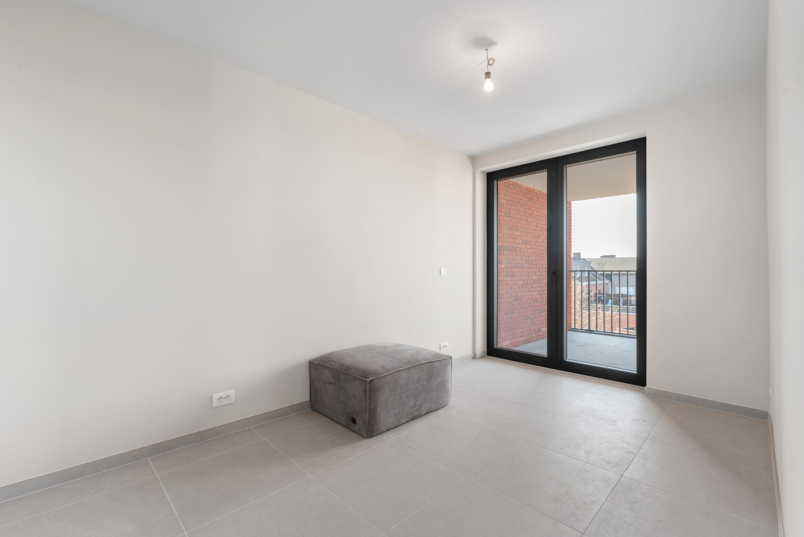 Nieuwbouwappartement met twee slaapkamers, terras en ondergrondse autostaanplaats te koop in Zulte 