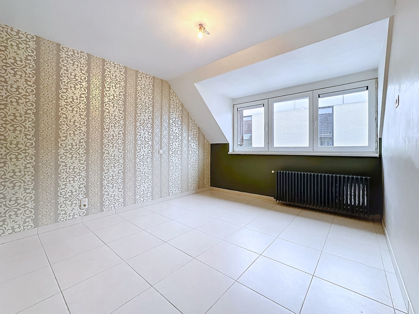 Opbrengsteigendom bestaande uit 3 appartementen + handelsgelijkvloers gelegen in het centrum 