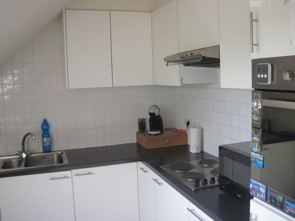 Bijzonder ruim 1-slp-appartement. Met terras. Met garage. 