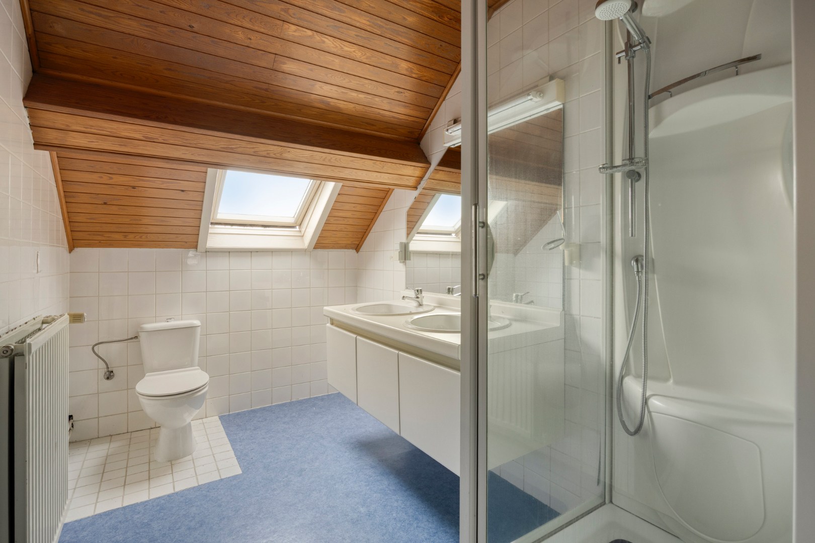 Building met handelspand en duplexappartement met 3 slpk. nabij het centrum van Leopoldsburg 