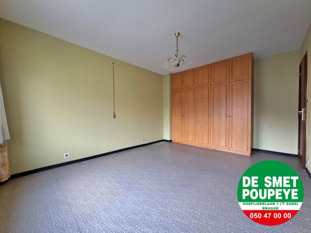 Ruime rijwoning met garage en tuin 