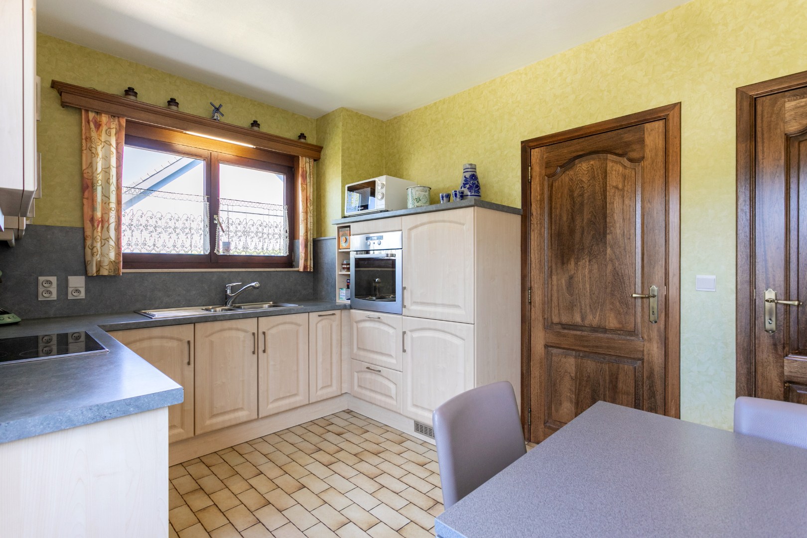 Verzorgde woning met 3 slpk, garage en tuin 
