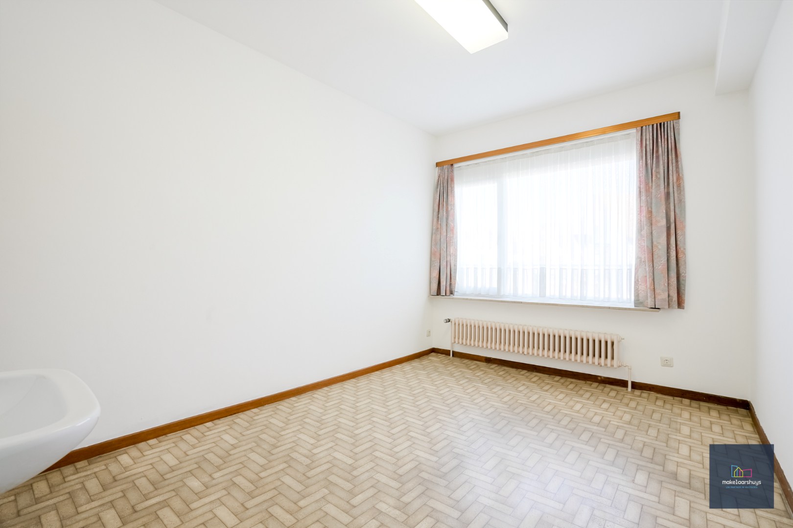 Ruim 3-slp.k.appartement met garage + kelder 