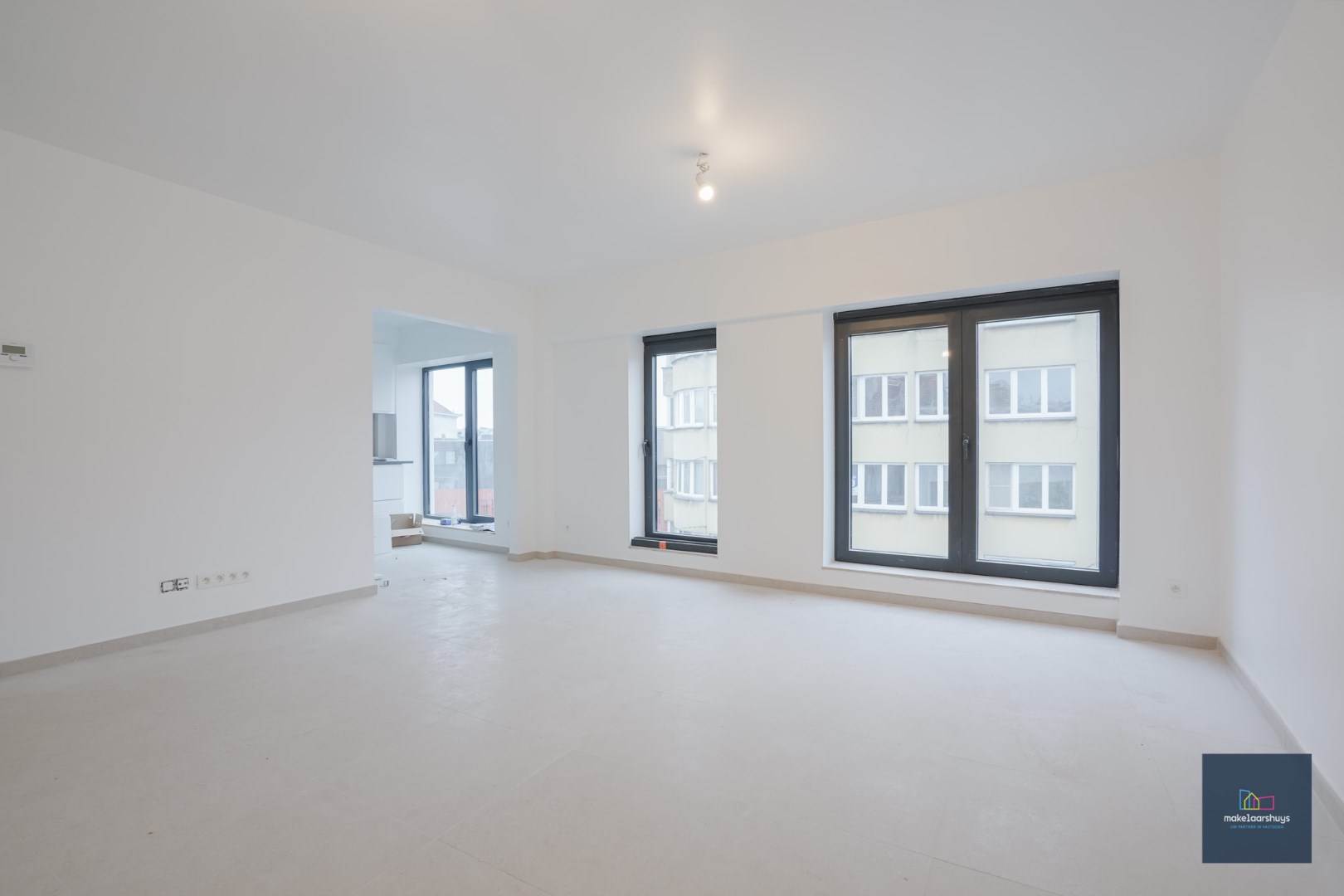 Nieuw gelijkvloers 2 slaapkamerappartement met koer 