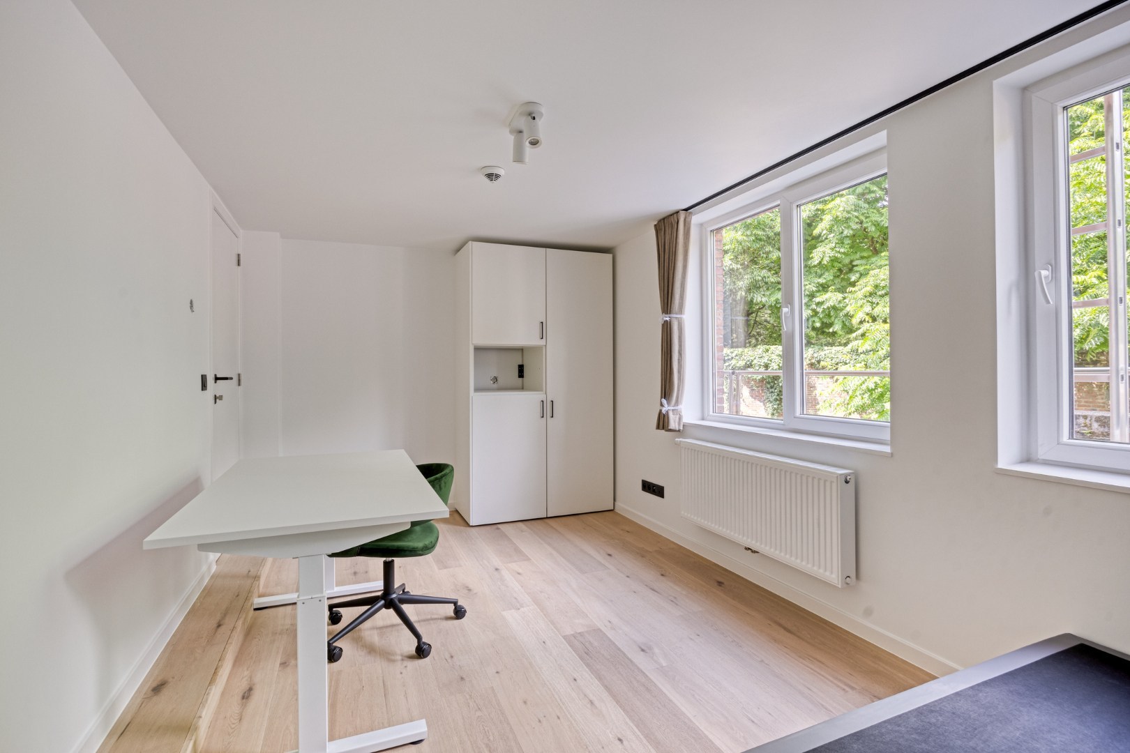 Volledig gerenoveerde studentenkamer in residentie met 29 studentenkamers met eigen sanitair en terras in hartje Leuven - EPC label A! 