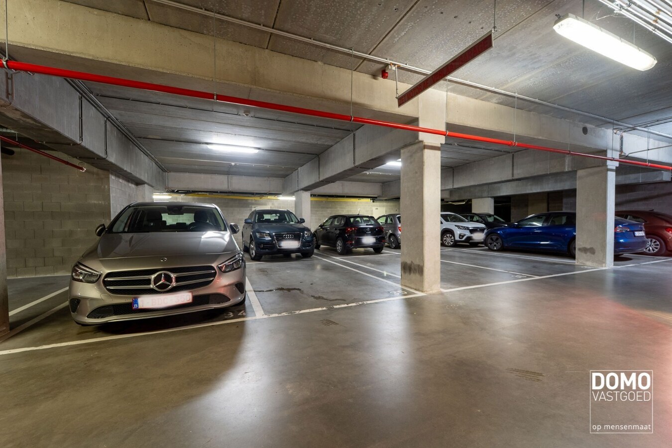 APPARTEMENT MET PRACHTIG TERRAS, 2 SLAAPKAMERS EN AUTOSTANDPLAATS TE KOOP AAN QUARTIER BLUE, HASSELT 