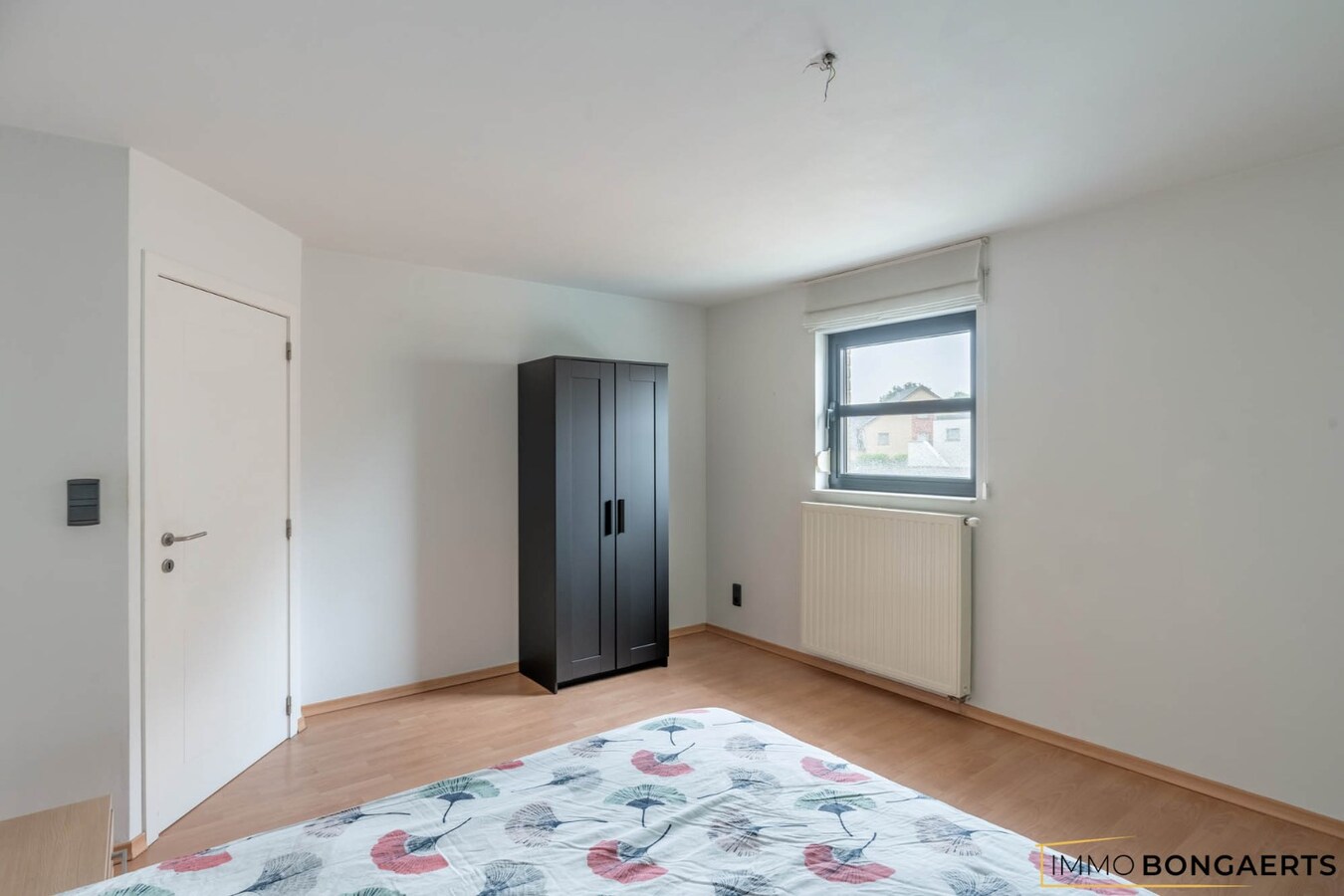 Ruime instapklare woning in het centrum van Neeroeteren met tuin, garage en 3 slaapkamers. 