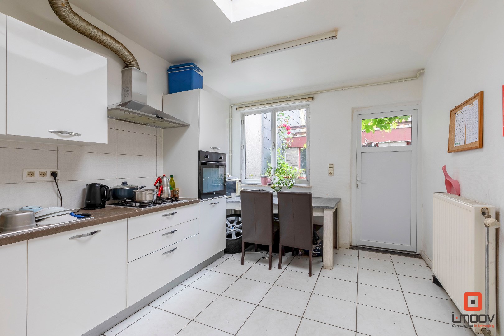 Ruime woning met 4 slaapkamers, koer en garage 