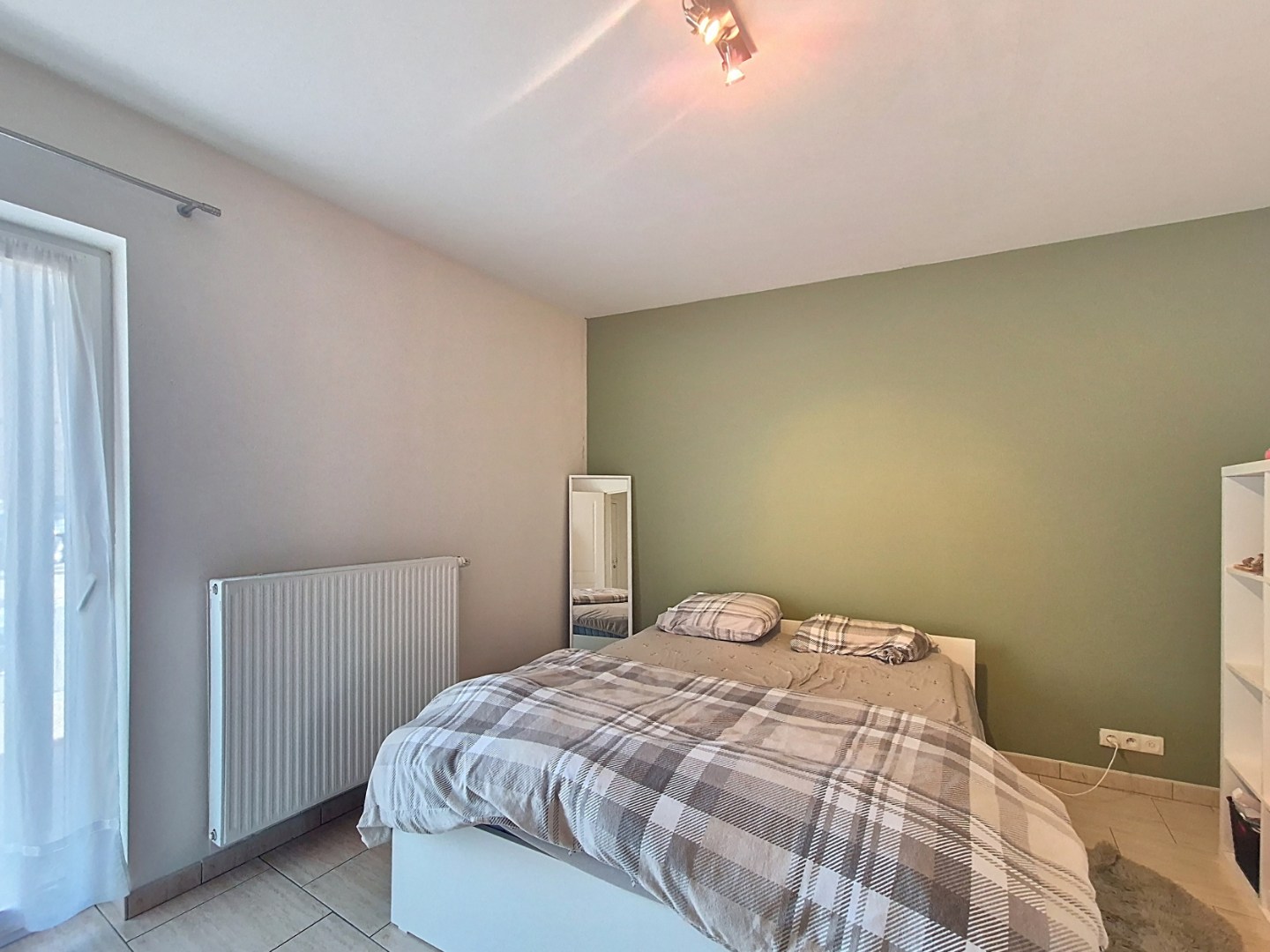 Gelijkvloers appartement met 1 slpk en garage 