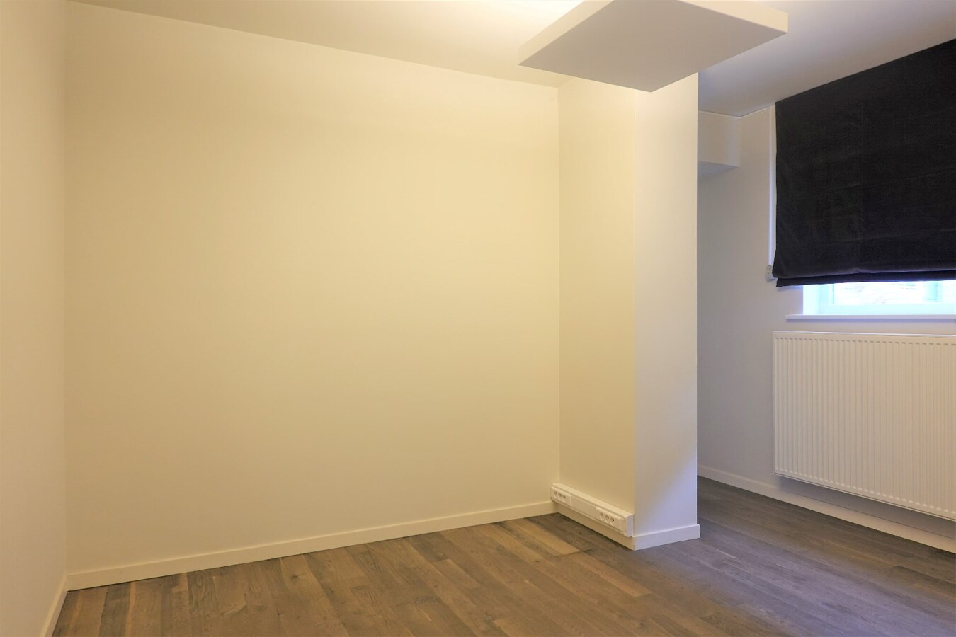 Ruim gelijkvloers appartement met koertje 