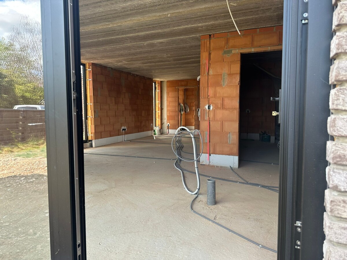 Mijmeren over de velden - in een luxueuze half open nieuwbouwwoning in Rotem 