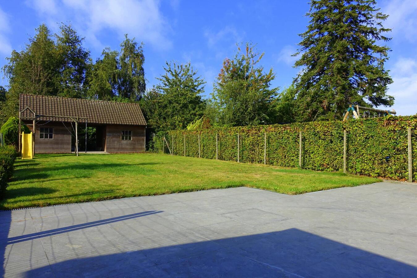 Gezellige half-open woning met zonnige tuin 