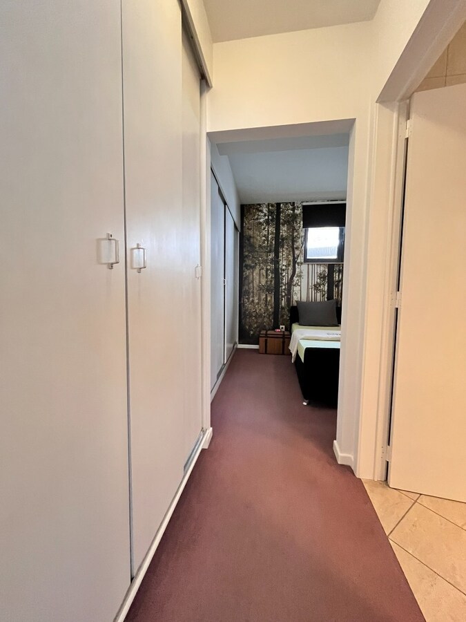 Comfortabel appartement op de 1ste verdieping van een kleinschalige residentie op een steenworp van de historische markt! 