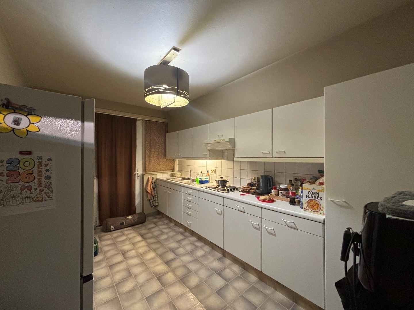 Opbrengsteigendom met 7 appartementen &amp; ruim handelspand in Mol-centrum 