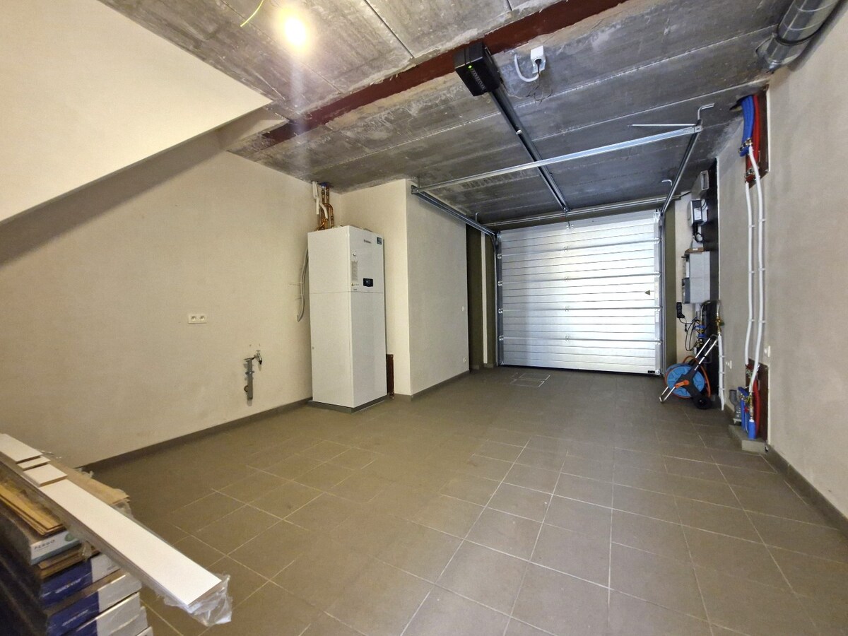 Nieuwbouwwoning met mooie tuin, garage en 4 slaapkamers te Dudzele 