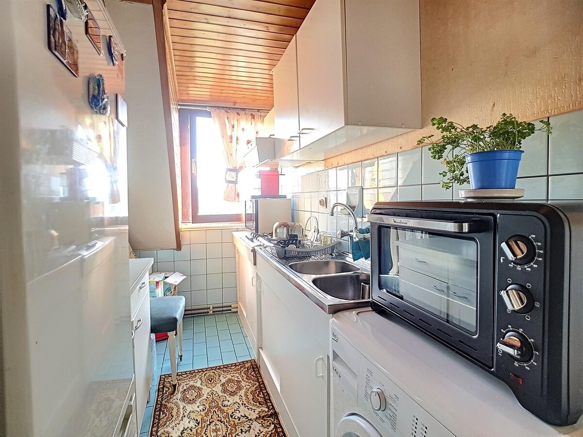 Dakppartement aan het marktplein te Heist 