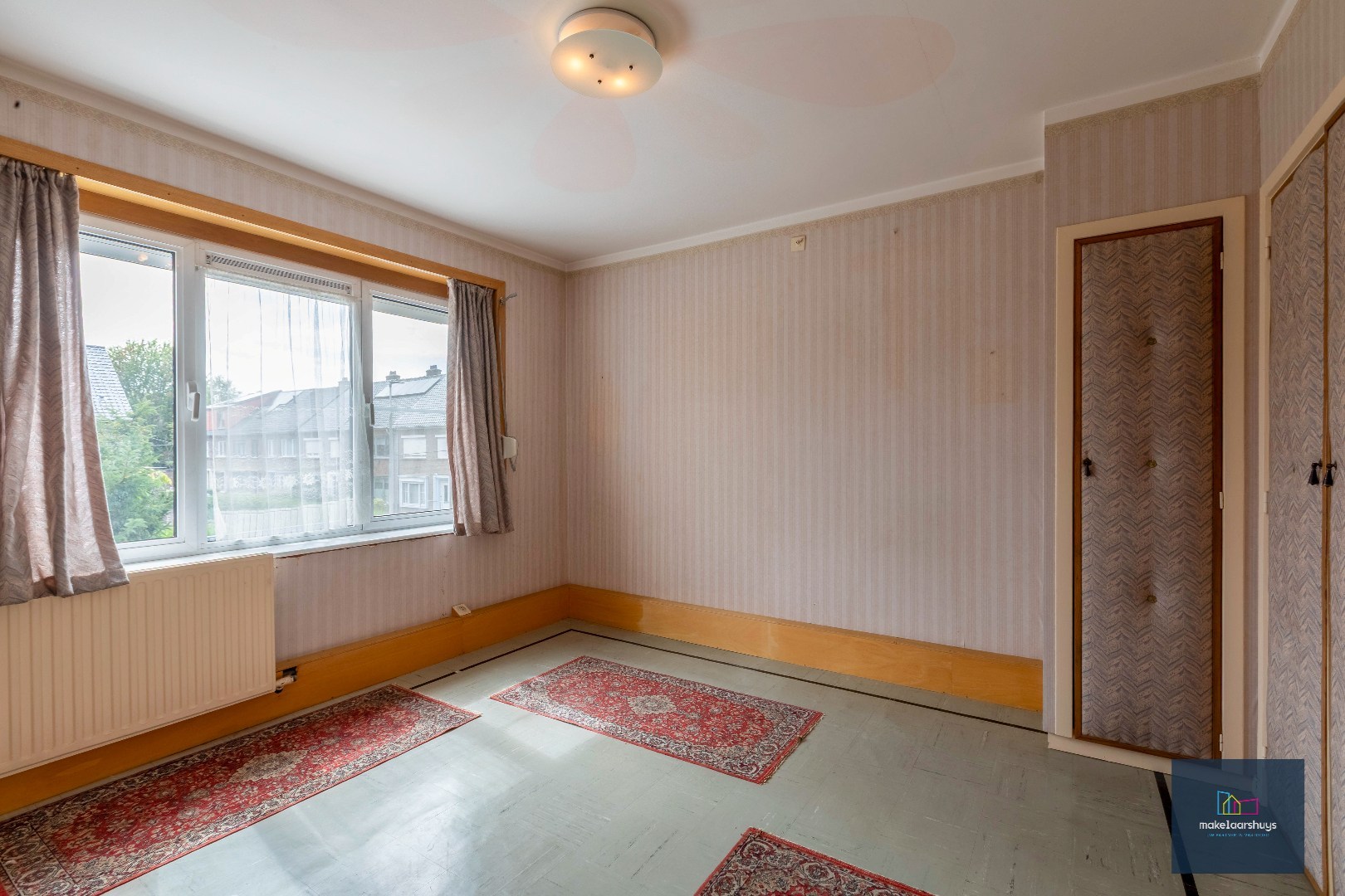 Gunstig gelegen woning met tuin en garage 