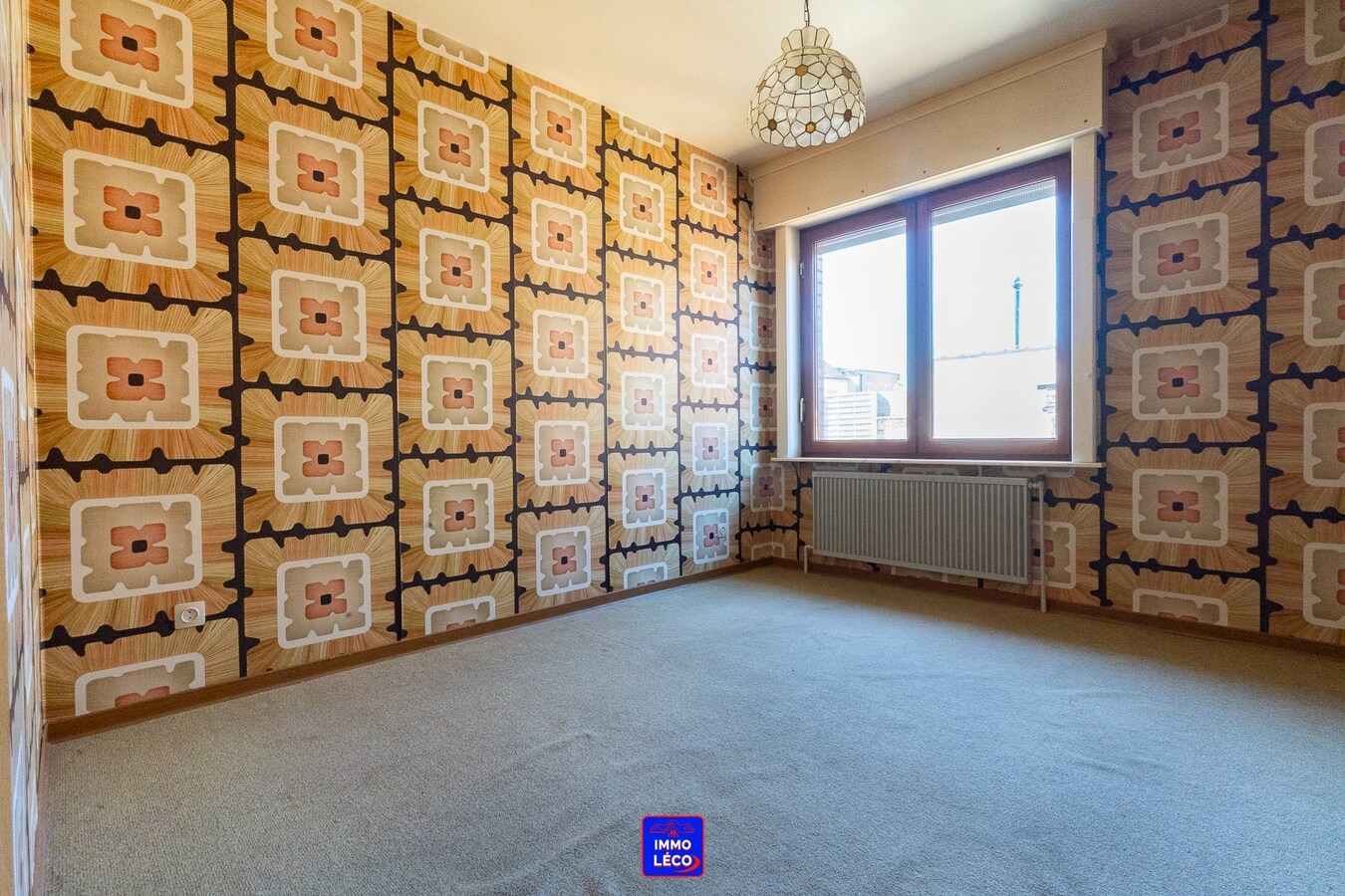 Villa "Plain-Pied" érigée sur 571m² avec garage, terrasse et jardin. 