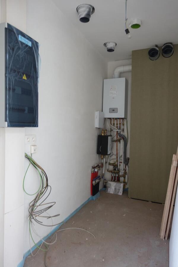 Hoek-assistentiewoning in nieuwbouwresidentie 