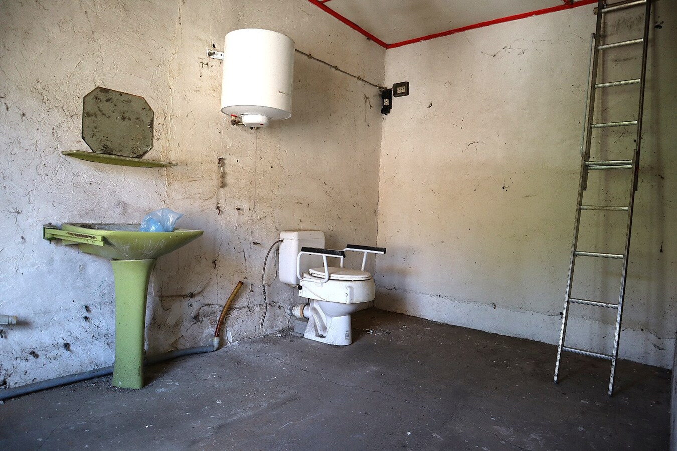 Te renoveren woning met magazijn/loods te Kessel-lo 