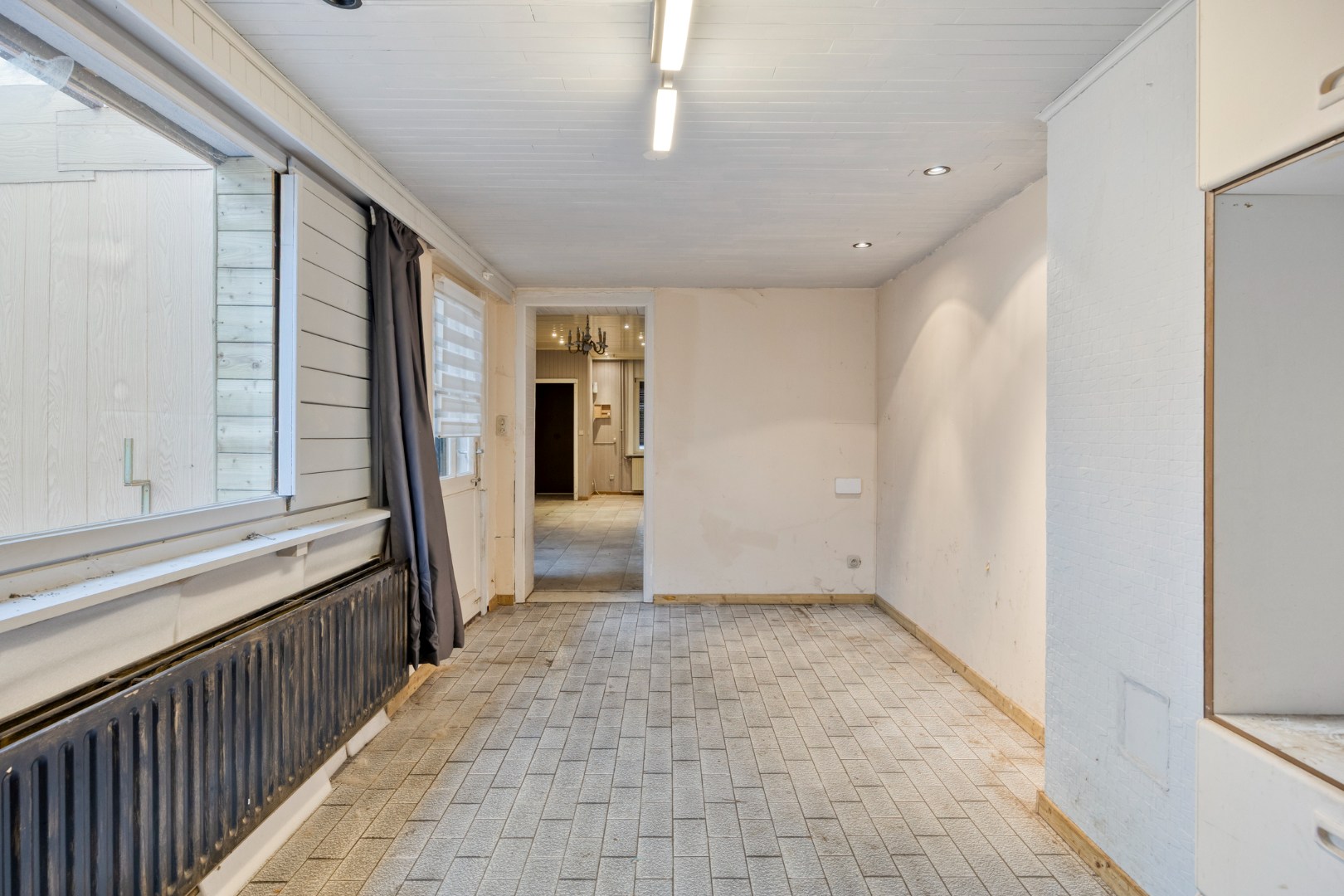 Te renoveren woning met 4 slpk. en gezellige stadstuin op een centrale ligging in Geel 