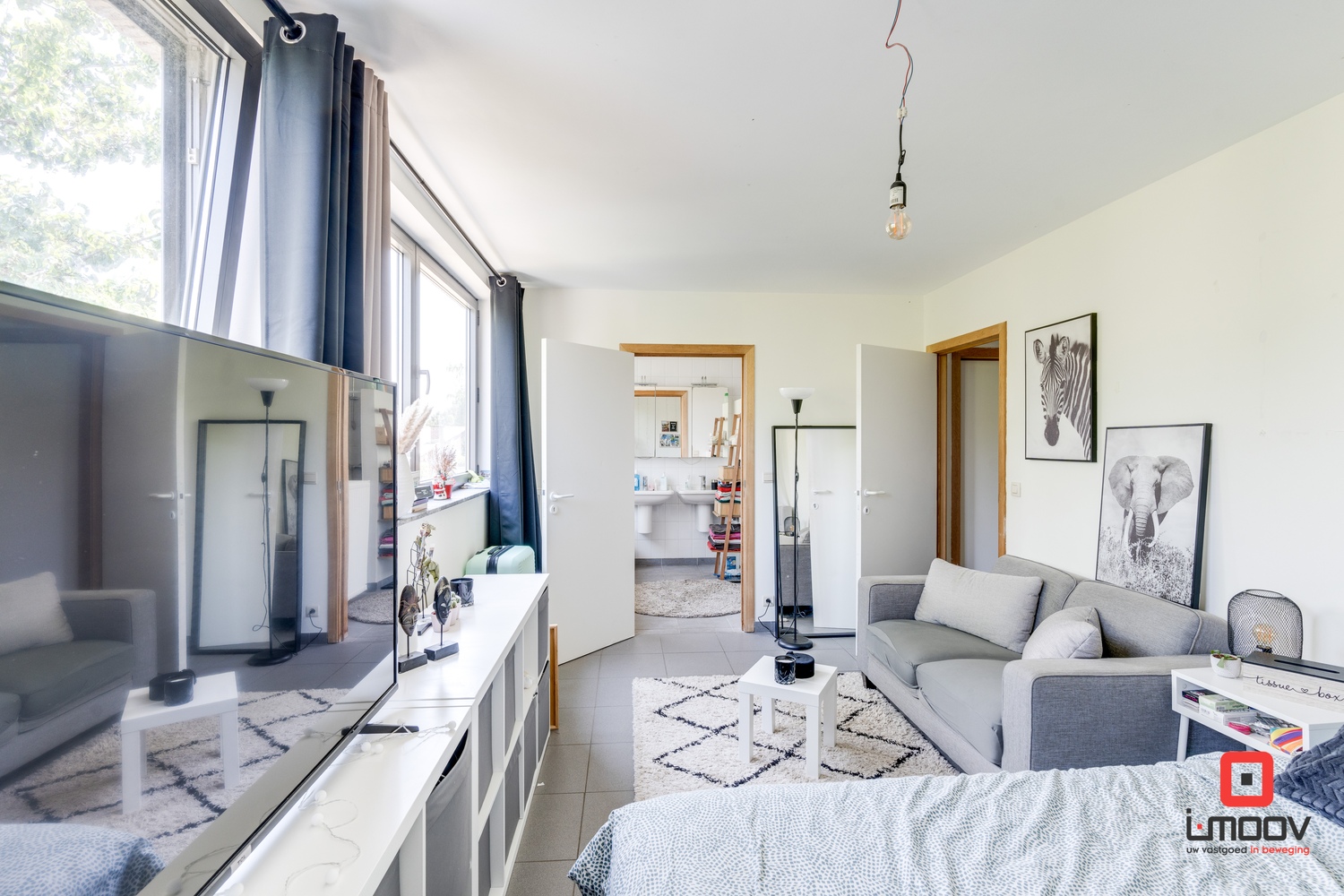 Ruime, lichtrijke halfopen bebouwing met tuin en oprit te Sint-Amandsberg 