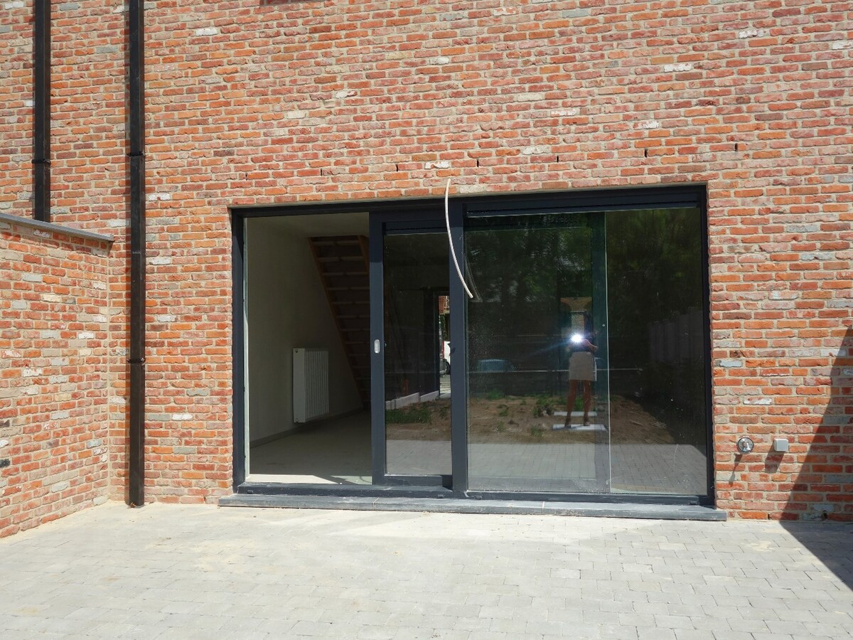 Construction moderne en plein coeur du village de Pecq ! 