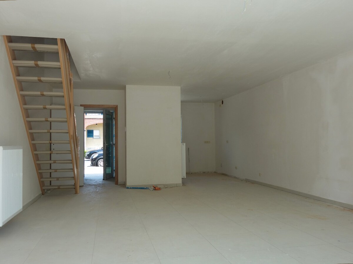 Construction moderne en plein coeur du village de Pecq ! 