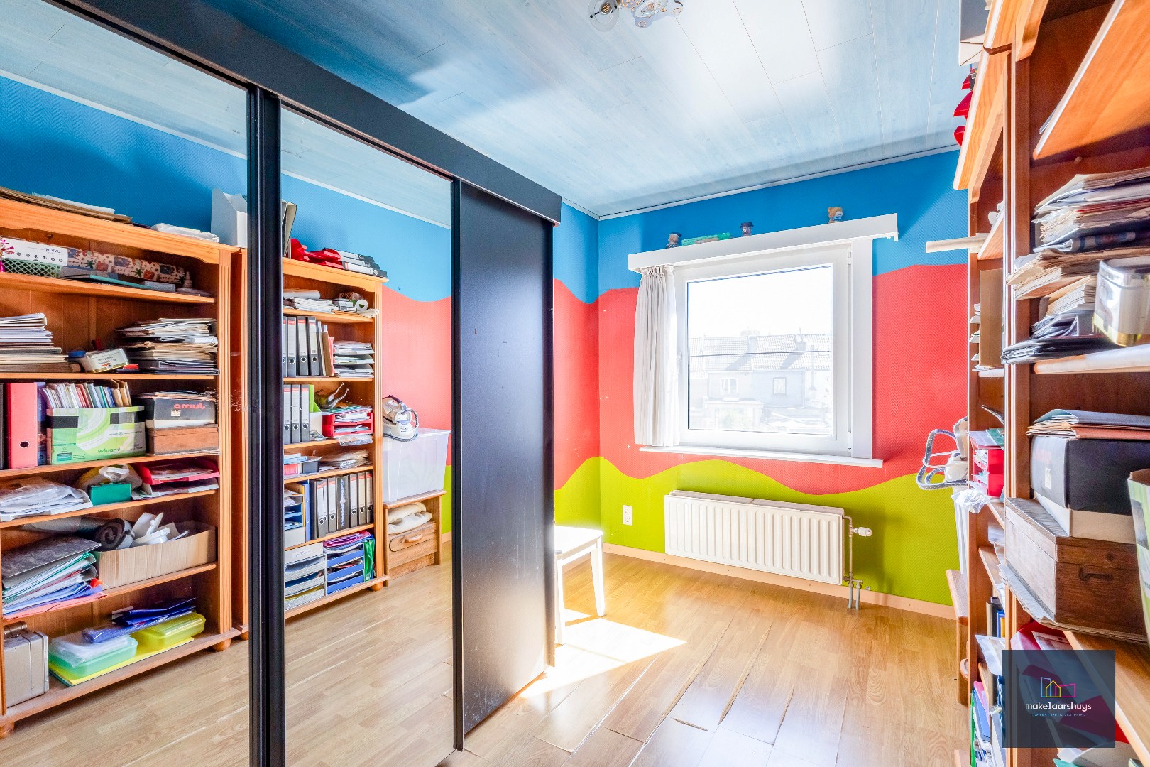 Goed onderhouden en ruime woning in rij met tuin/terras te Wondelgem 